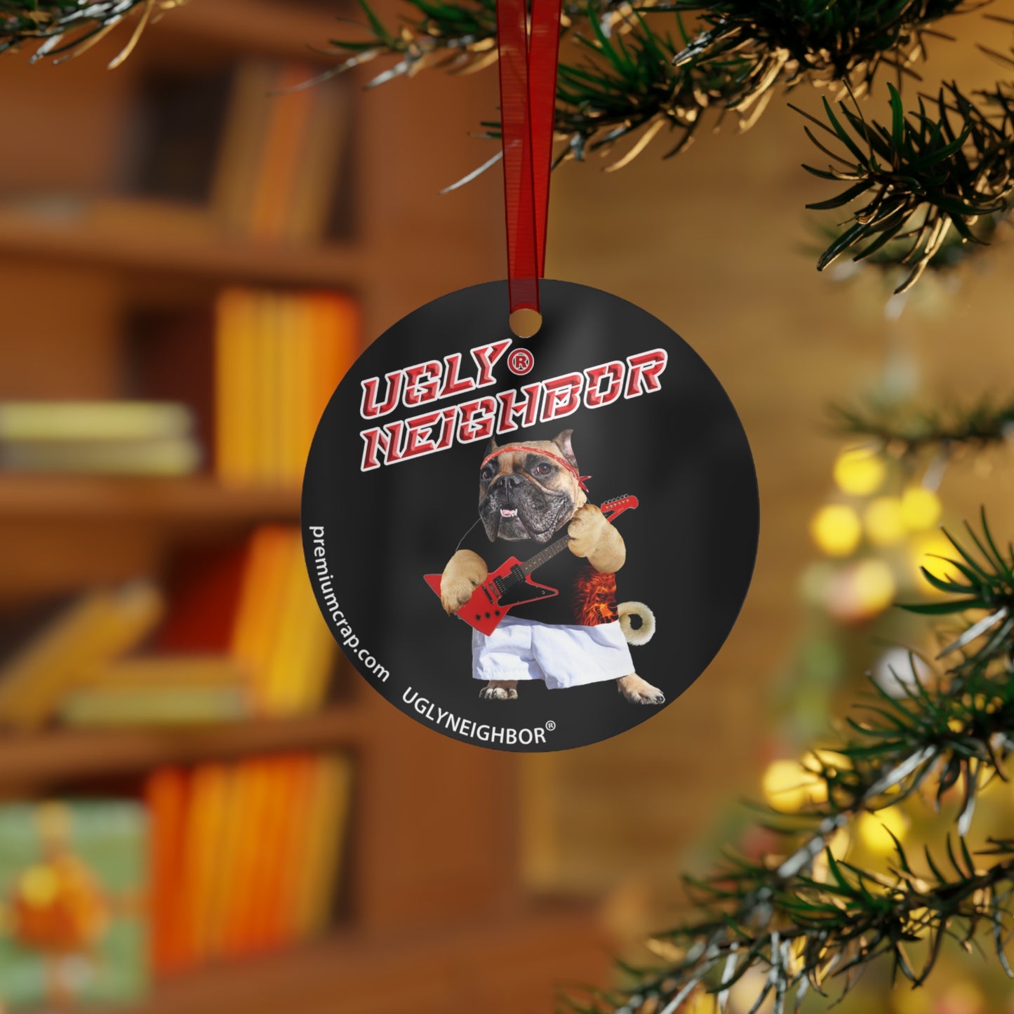 A tree-shaped metal ornament with a image of a dog.
