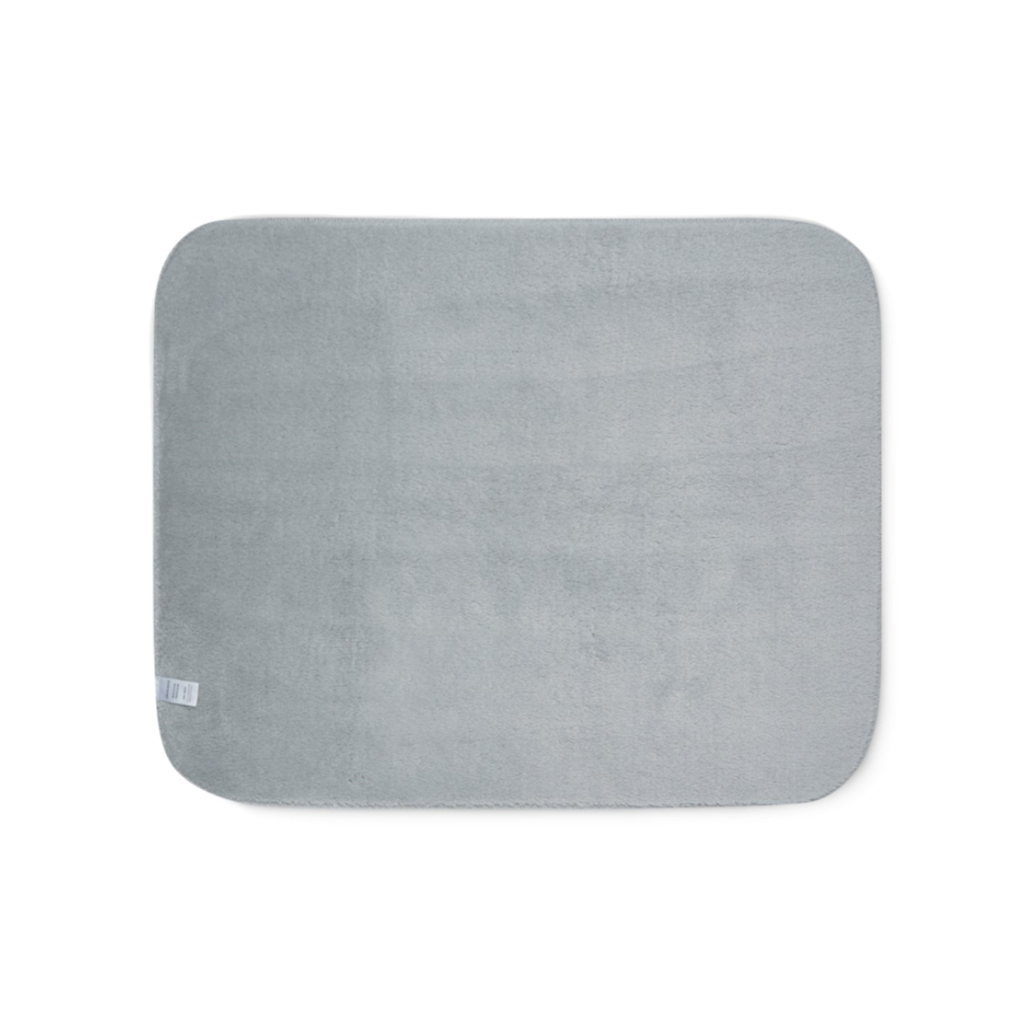 Gray rectangular bath mat on a white background