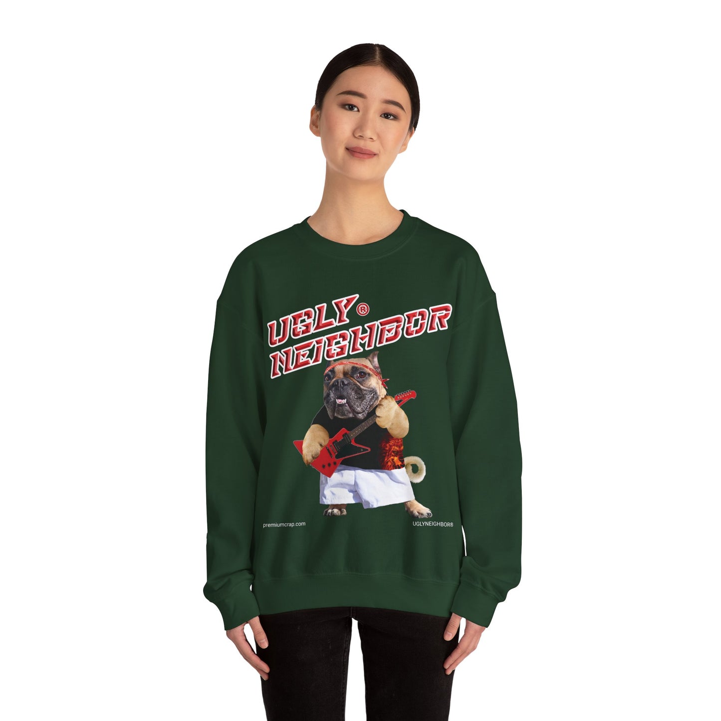 Person wearing a green sweatshirt with a graphic design of a pug and text on a white background