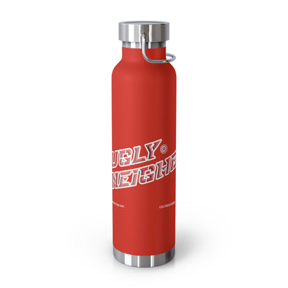 Red water bottle with silver lid and handle on a white background