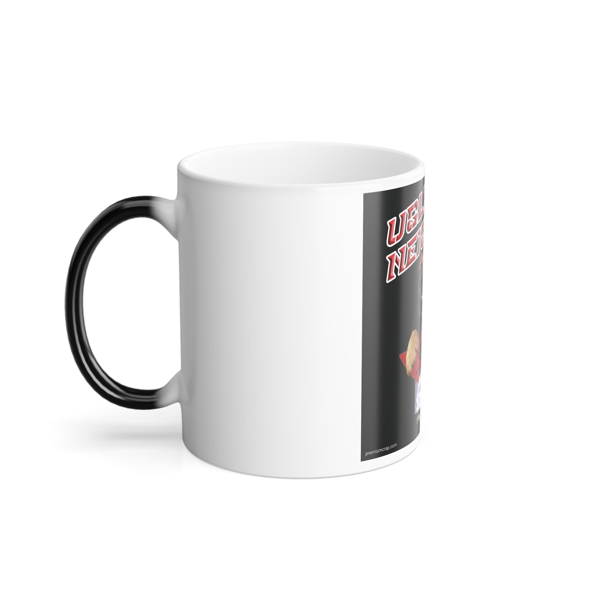 A white ceramic mug with a black handle and a black side panel featuring red text and a small graphic, shown on a clean white background.