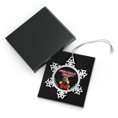 Decorative snowflake ornament with butterfly design on a black card, open black box in the background.