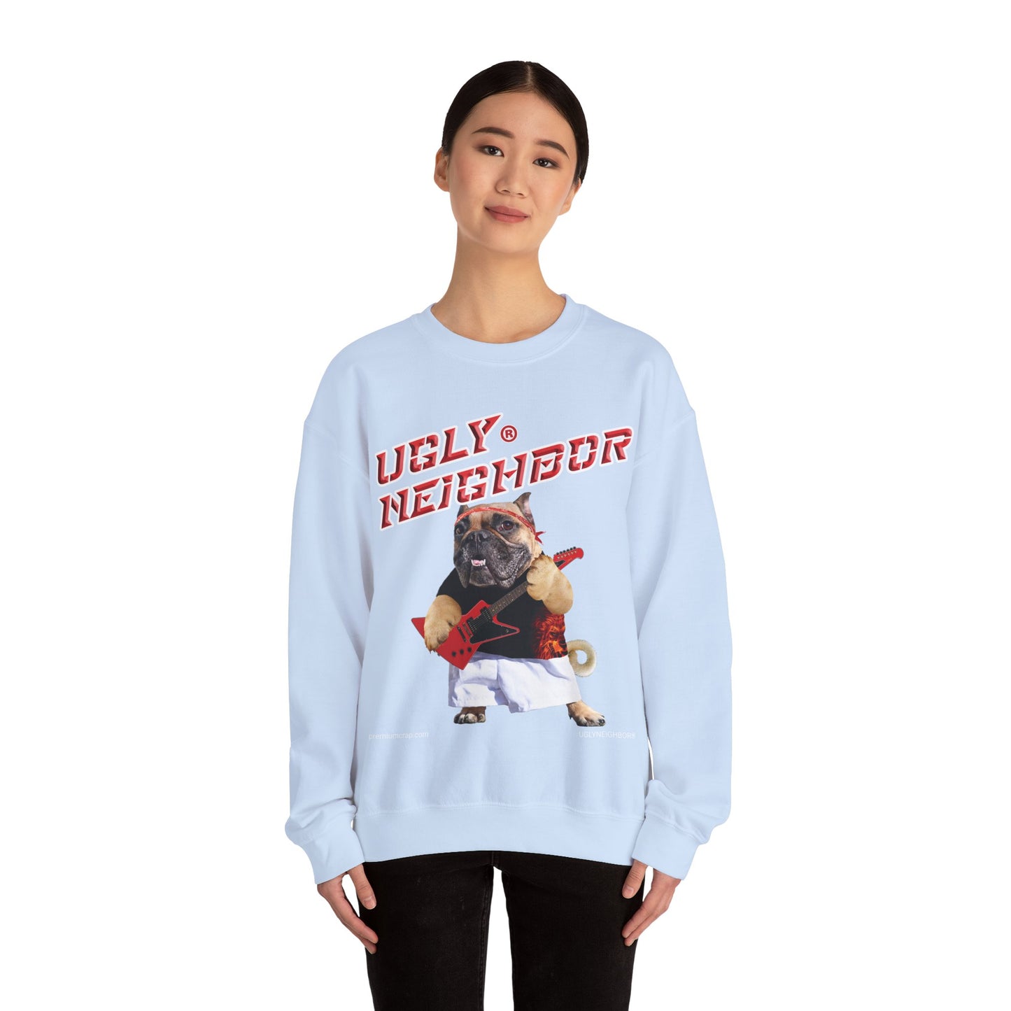 Light blue sweatshirt with a printed image of a dog on a white background