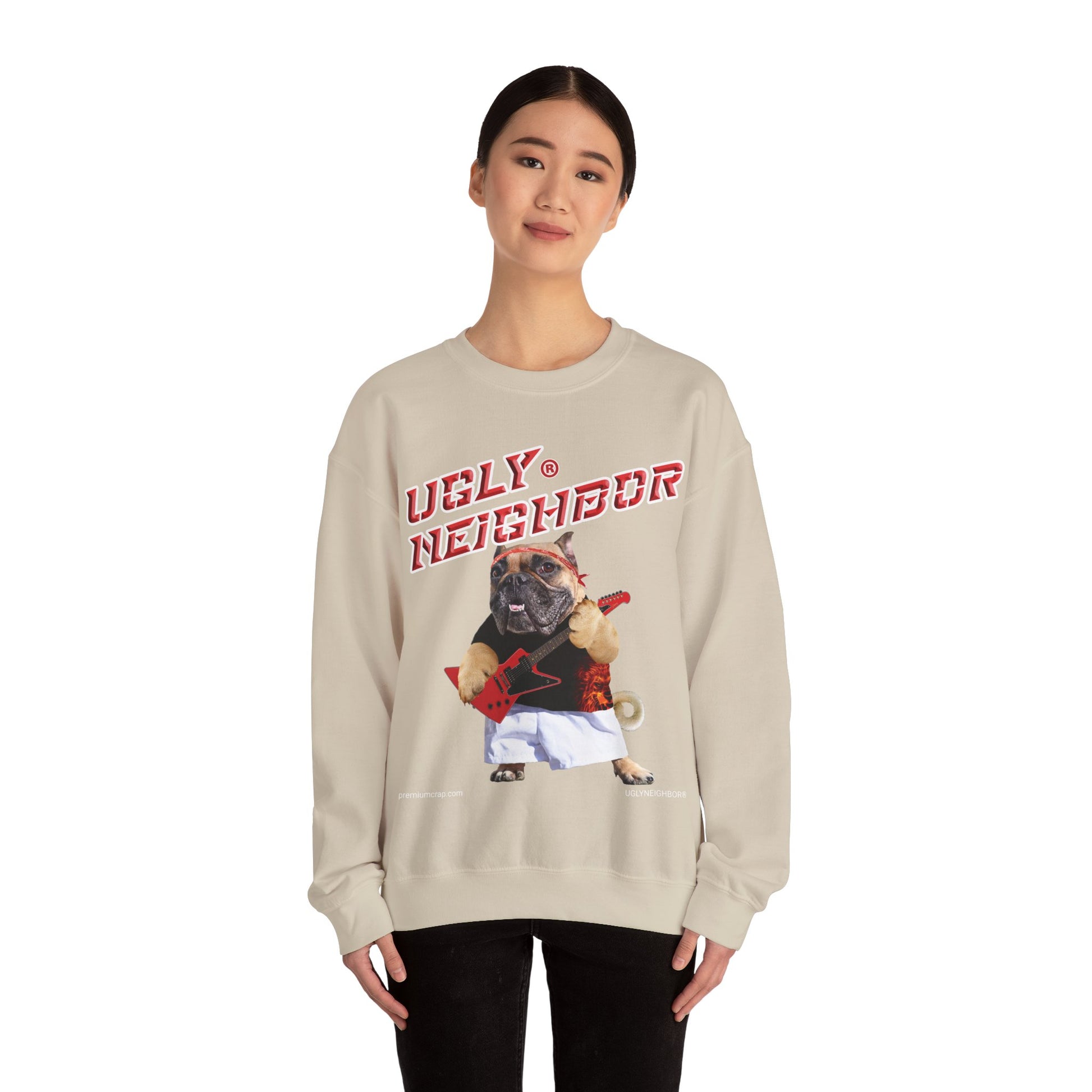 Person wearing a beige sweatshirt with a graphic of a dog and 'Ugly Neighbor' text on a white background