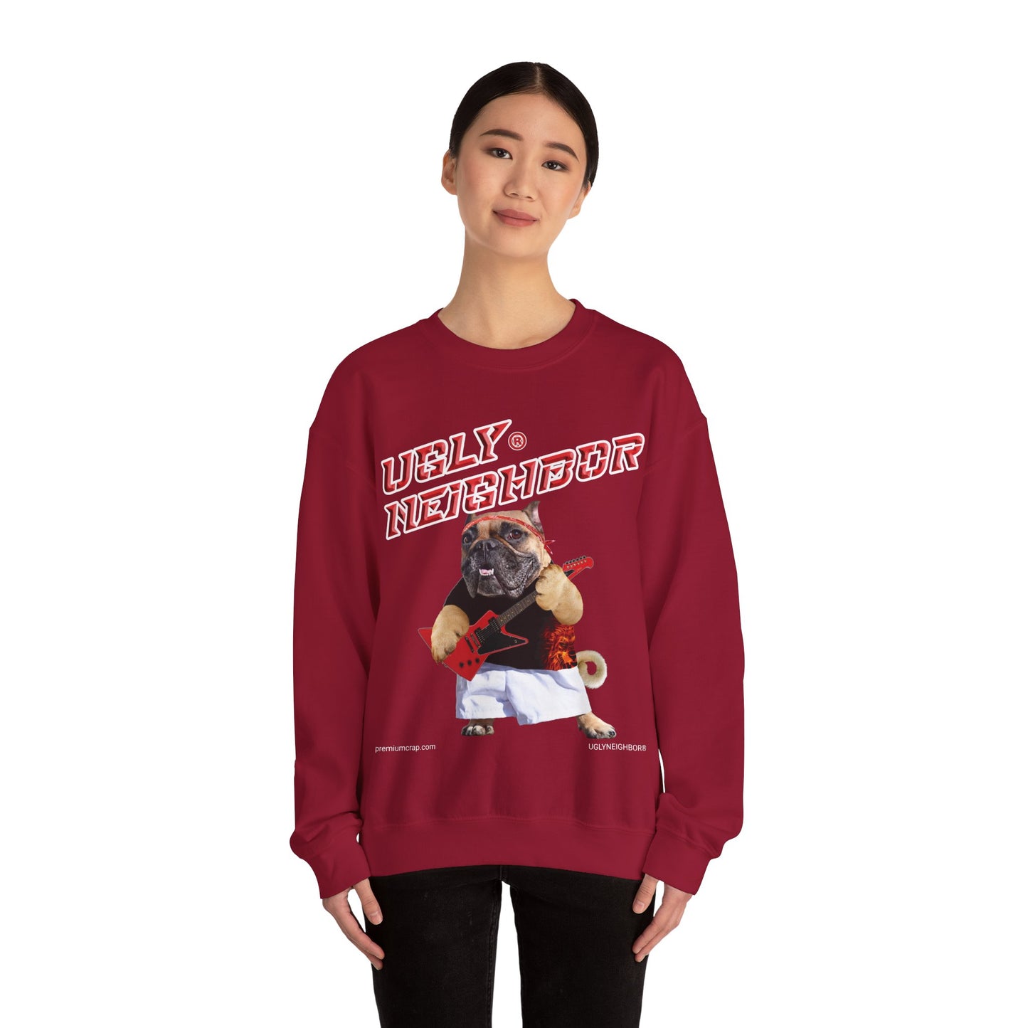 Person wearing a red sweatshirt with a graphic design on a white background