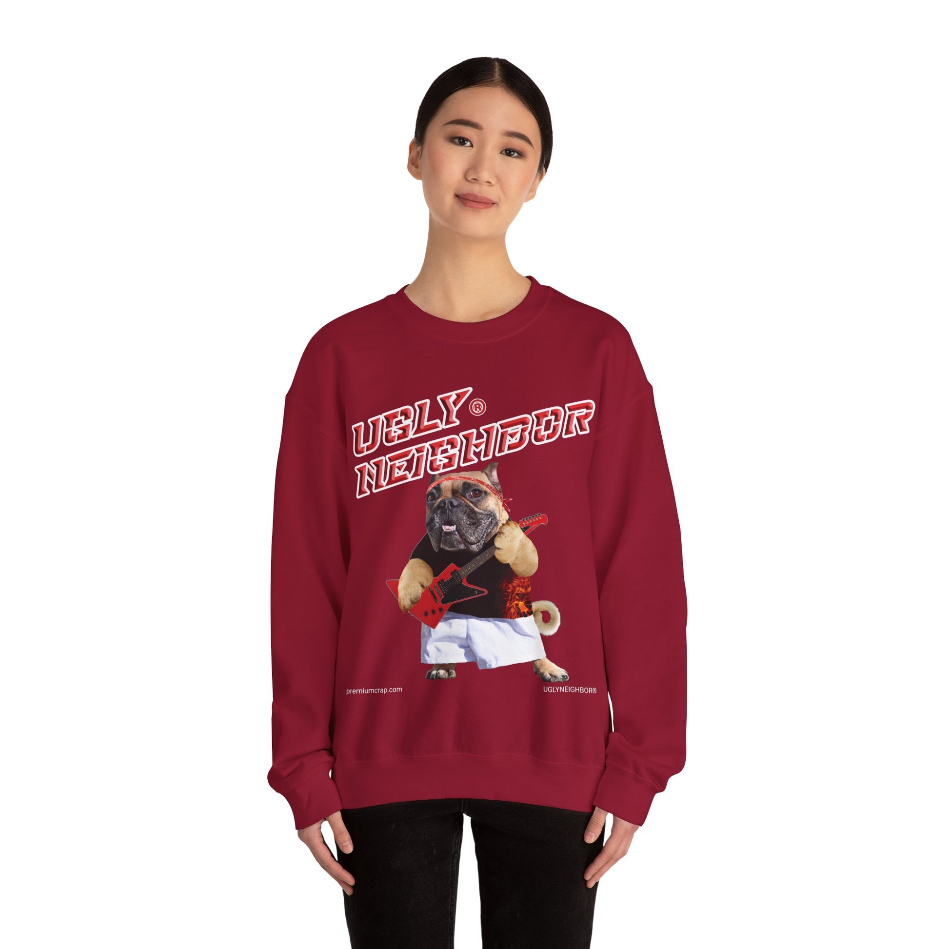 Person wearing a red sweatshirt with a graphic design on a white background
