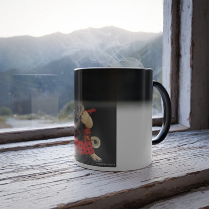 A ceramic mug with a black and white gradient design and a cartoon dog illustration, sitting on a rustic wooden windowsill with steam rising from the top, set against a blurred mountain landscape.