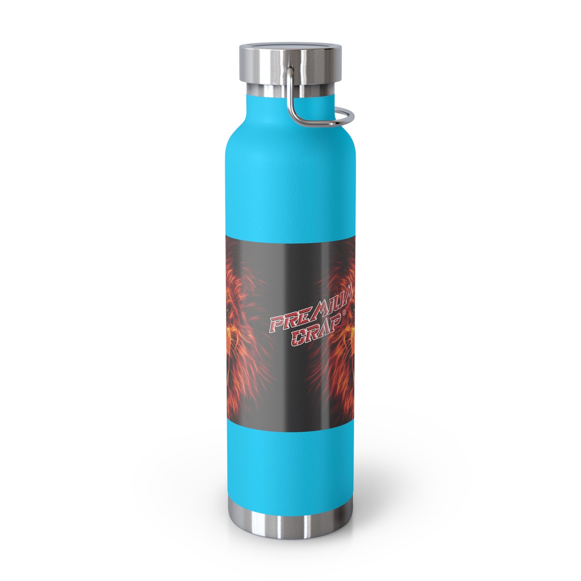 A reusable insulated water bottle with a bright turquoise blue body, a black wrap-around graphic label featuring red/orange flames and the words 'Premium Crap', and silver metal accents at the cap, base, and carrying loop, shown on a white background.