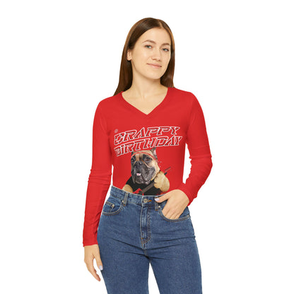 Woman wearing a red long-sleeve shirt with a graphic design on a white background