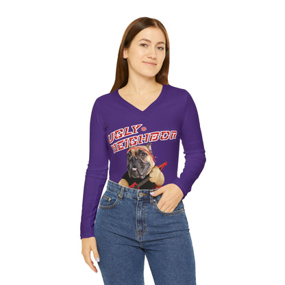Woman wearing a purple long-sleeve shirt with a graphic design on a white background