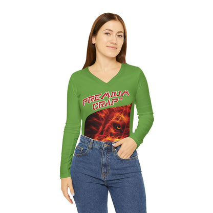 Woman wearing a green long-sleeve shirt with a graphic design on a white background